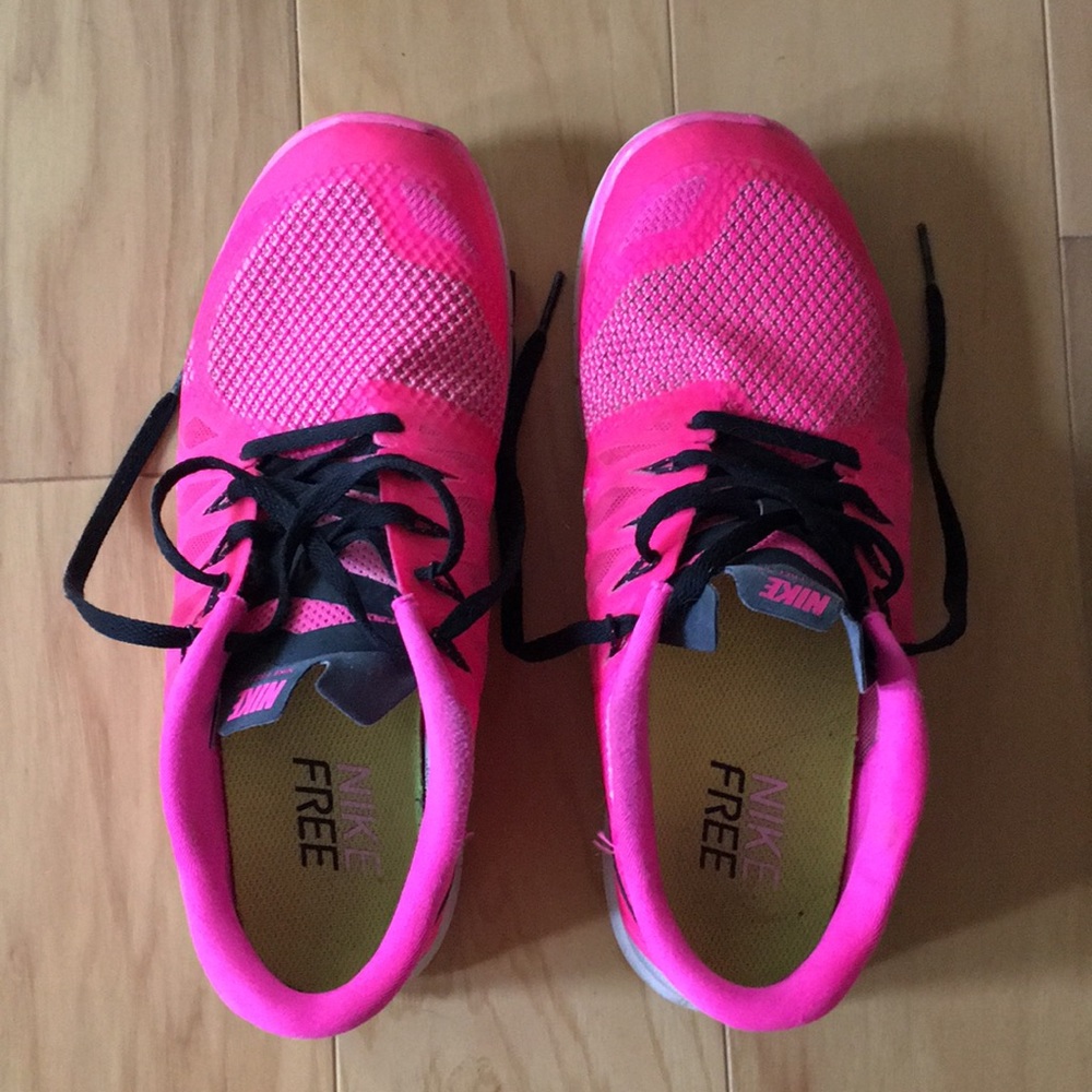 Hot pink Nike Free Runs 5.0
